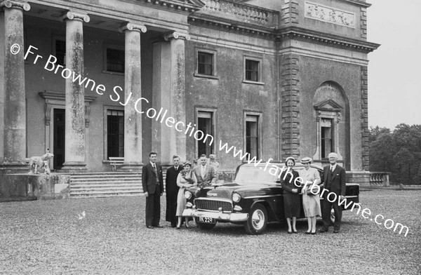 EMO COURT   FRONT OF HOUSE  GROUP WITH CAR